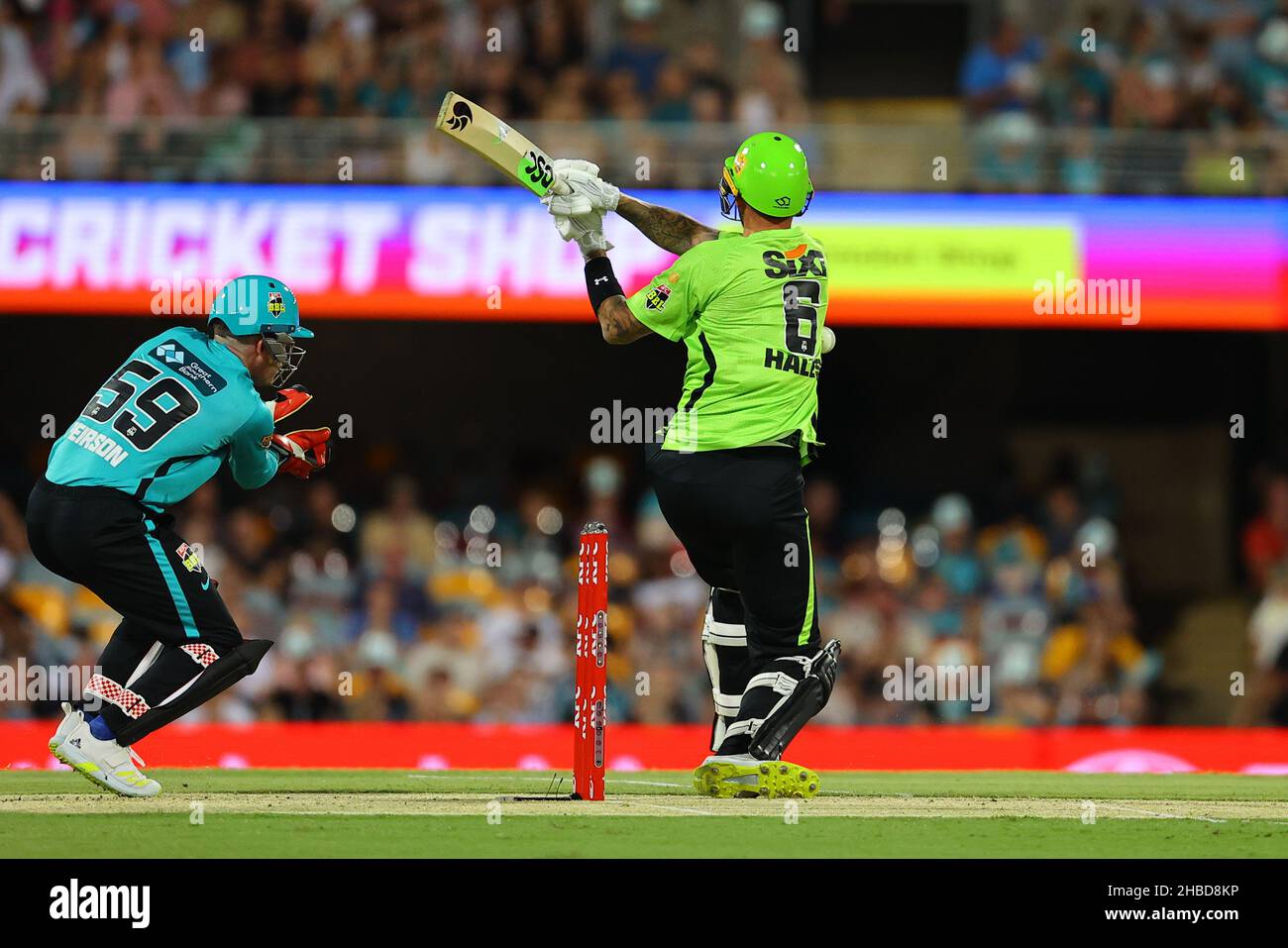 Brisbane, Australia. 19th Dec, 2021. Alex Hales of the Sydney Thunder is struck by the ball Credit: News Images /Alamy Live News Stock Photo