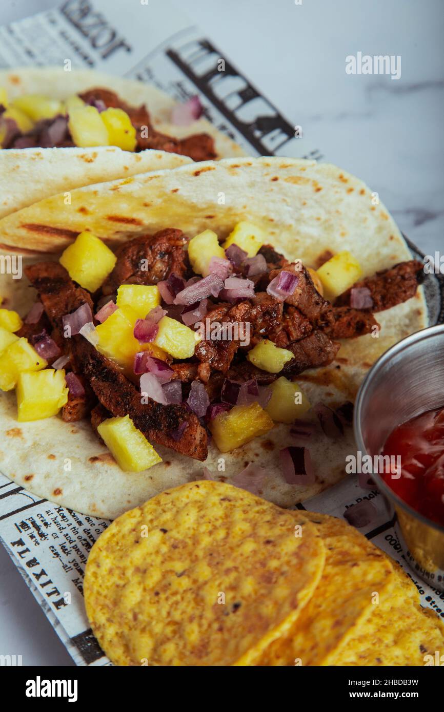 Traditional Mexican food tacos al pastor. vertical picture Stock Photo