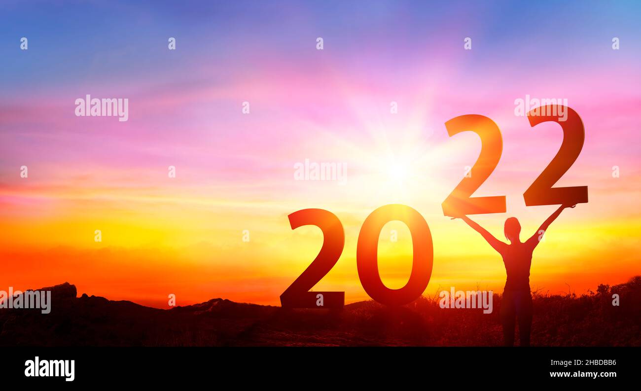 2022 Celebration New Year - Happy Woman At Sunrise - Contain 3d Rendering Stock Photo