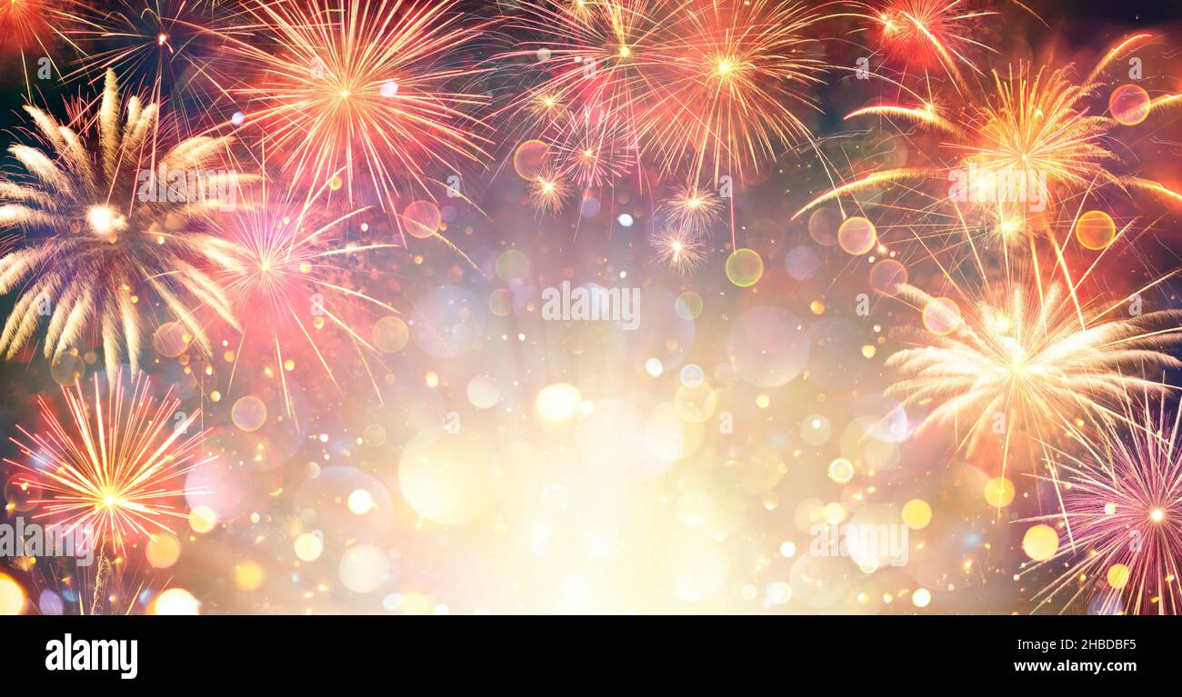 Fireworks With Golden Lights - Anniversary Celebration In Night With Abstract Defocused Bokeh Stock Photo