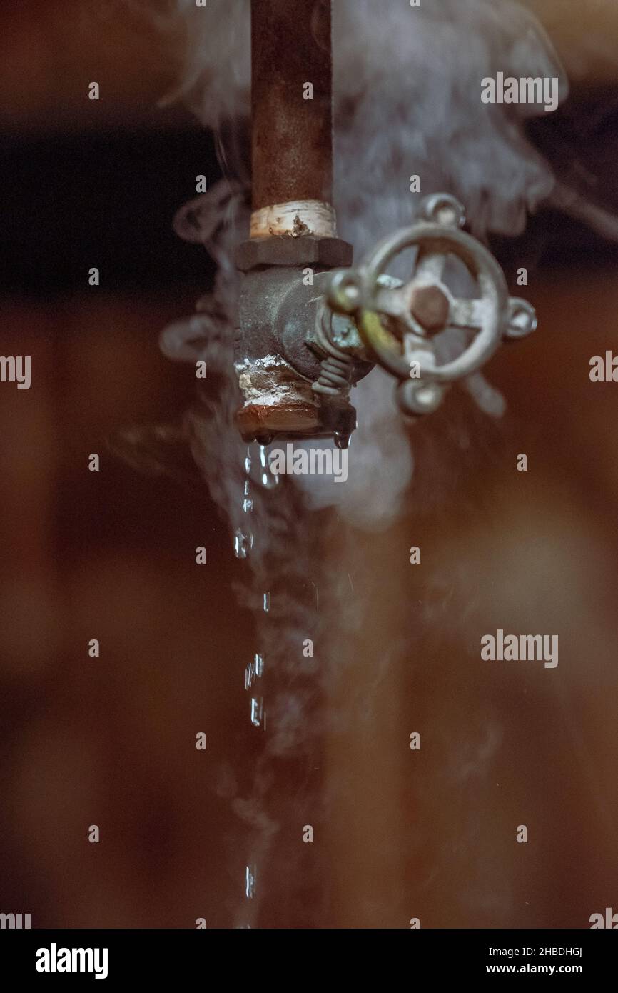 The broken valves leaking water and vapor Stock Photo Alamy