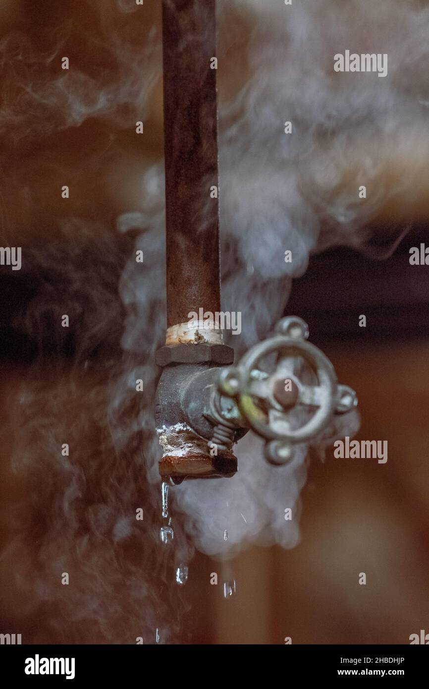 The broken valves leaking water and vapor Stock Photo Alamy