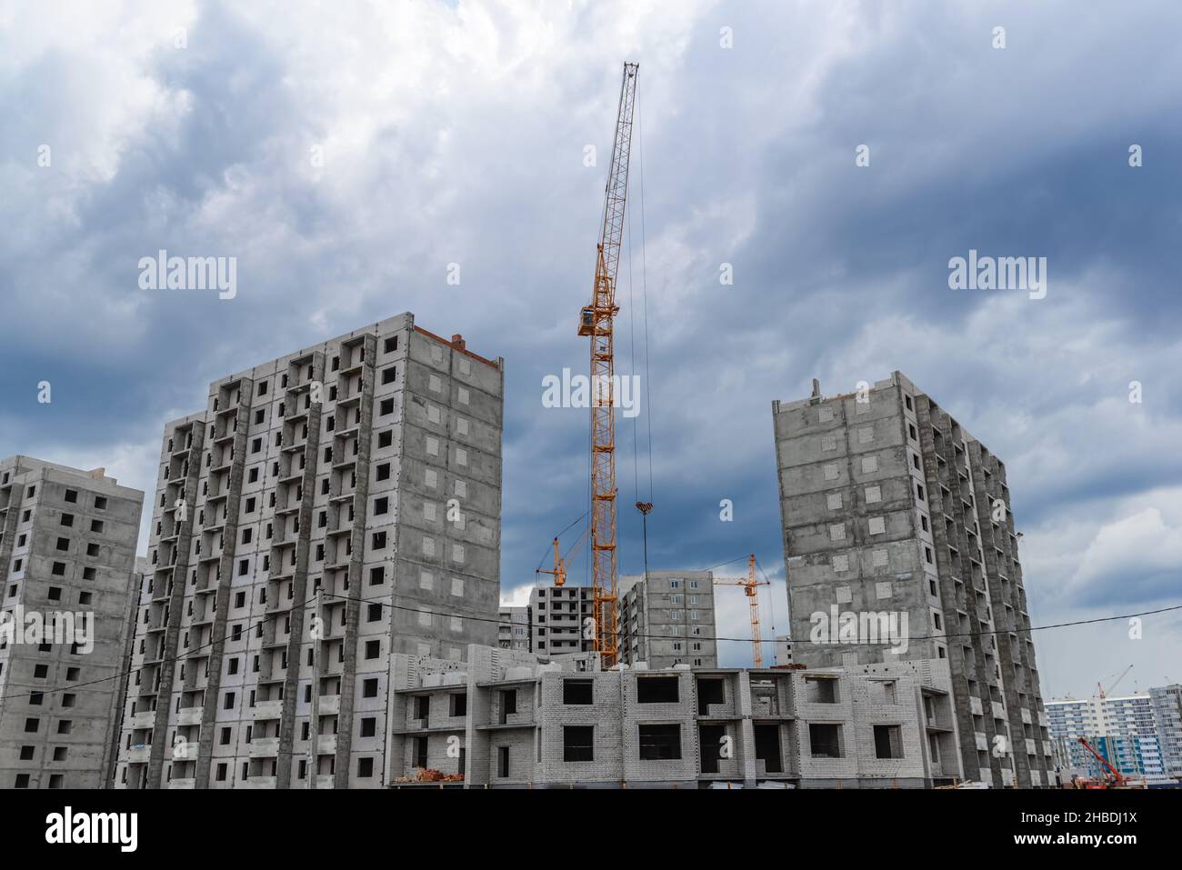 Crane and building construction site Stock Photo