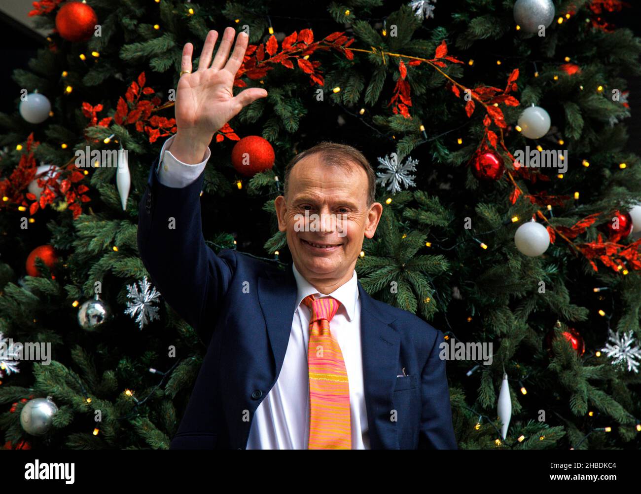 London, UK. 19th Dec, 2021. Andrew Marr waves goodbye as he leaves the BBC Studios after presenting his final show. He is joining Global radio and writing and presenting for other companies in the New Year. He is leaving the BBC after 21 years including 16 years presenting his Sunday morning show. Credit: Tommy London/Alamy Live News Stock Photo