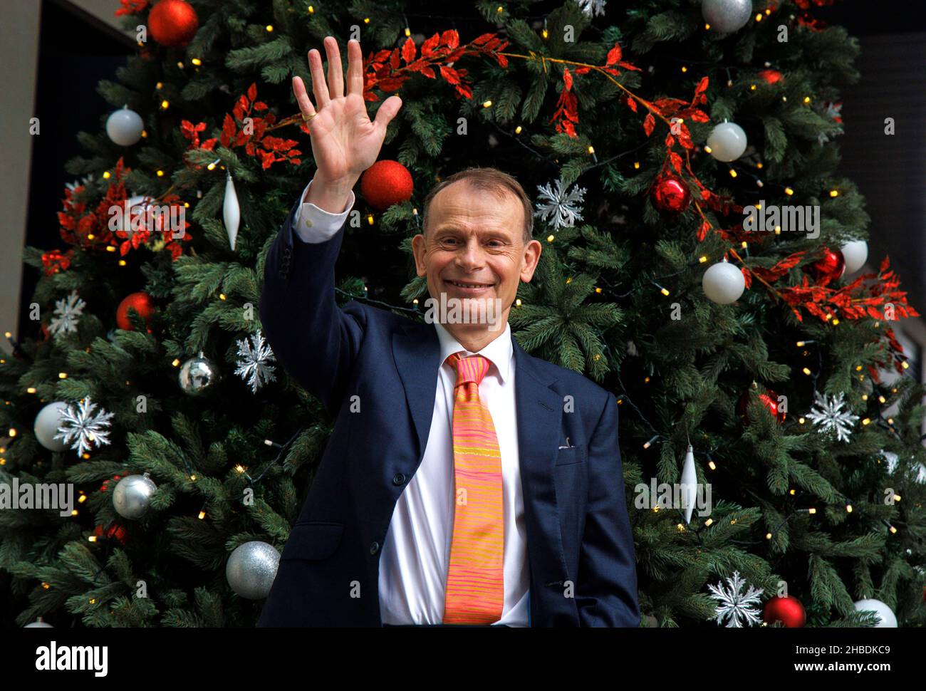 London, UK. 19th Dec, 2021. Andrew Marr waves goodbye as he leaves the BBC Studios after presenting his final show. He is joining Global radio and writing and presenting for other companies in the New Year. He is leaving the BBC after 21 years including 16 years presenting his Sunday morning show. Credit: Tommy London/Alamy Live News Stock Photo