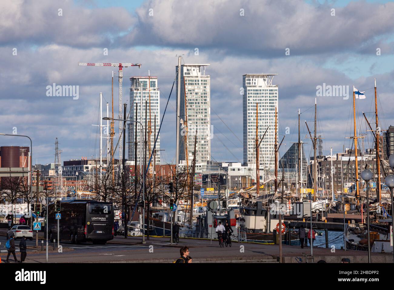 Kalasatama high-rise buildings behind Halkolaituri sailing ships in Helsinki, Finland Stock Photo