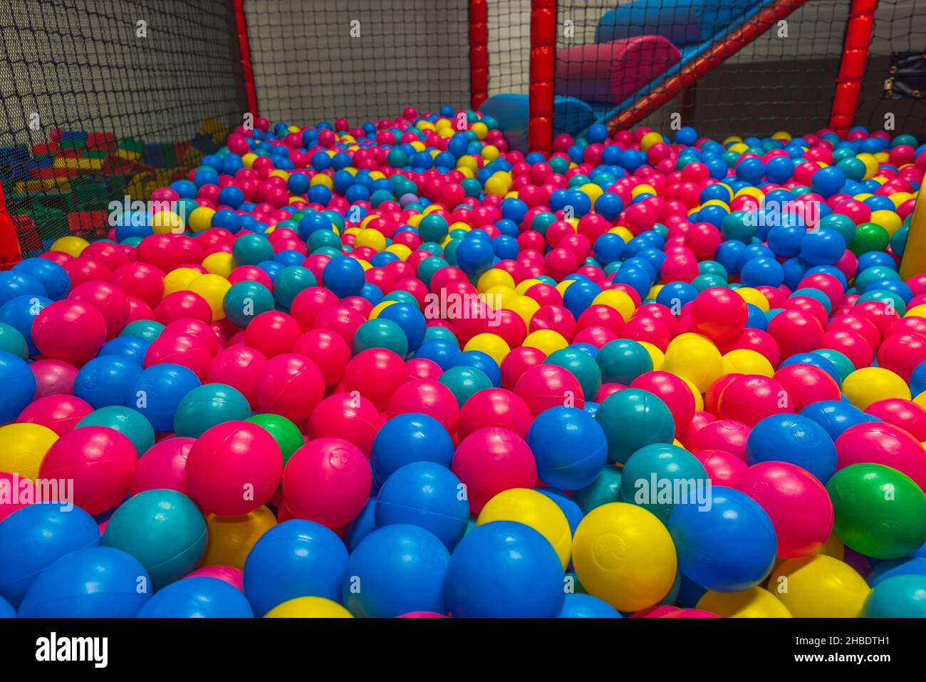 View of with plastic balls indoor playground in activity center. Sweden