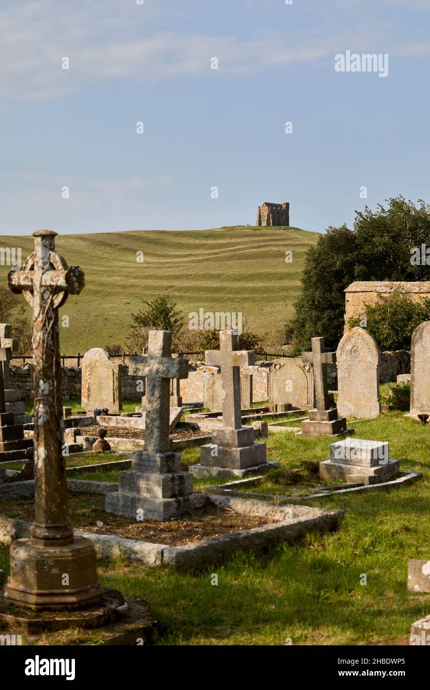 St Catherine's Chapel, a small chapel on Chapel Hill above Abbotsbury village in Dorset, south-west England, seen from St Nicholas Church churchyard Stock Photo