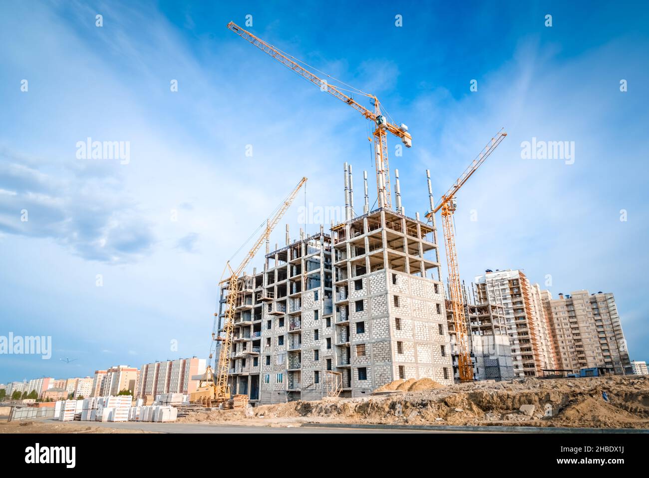 Construction of new apartments and crane Stock Photo
