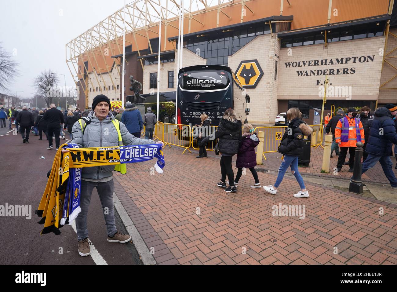 A scarf seller prior to kick-off during the Premier League match at the Molineux stadium, Wolverhampton. Picture date: Sunday December 19, 2021. Stock Photo