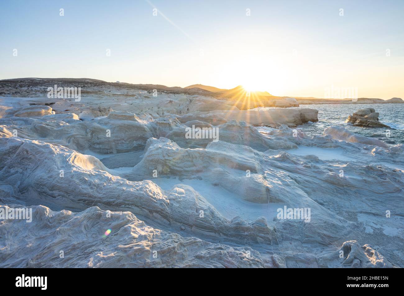 Sarakiniko Beach Cliffs Milos Island Greece. Sunset Stock Photo