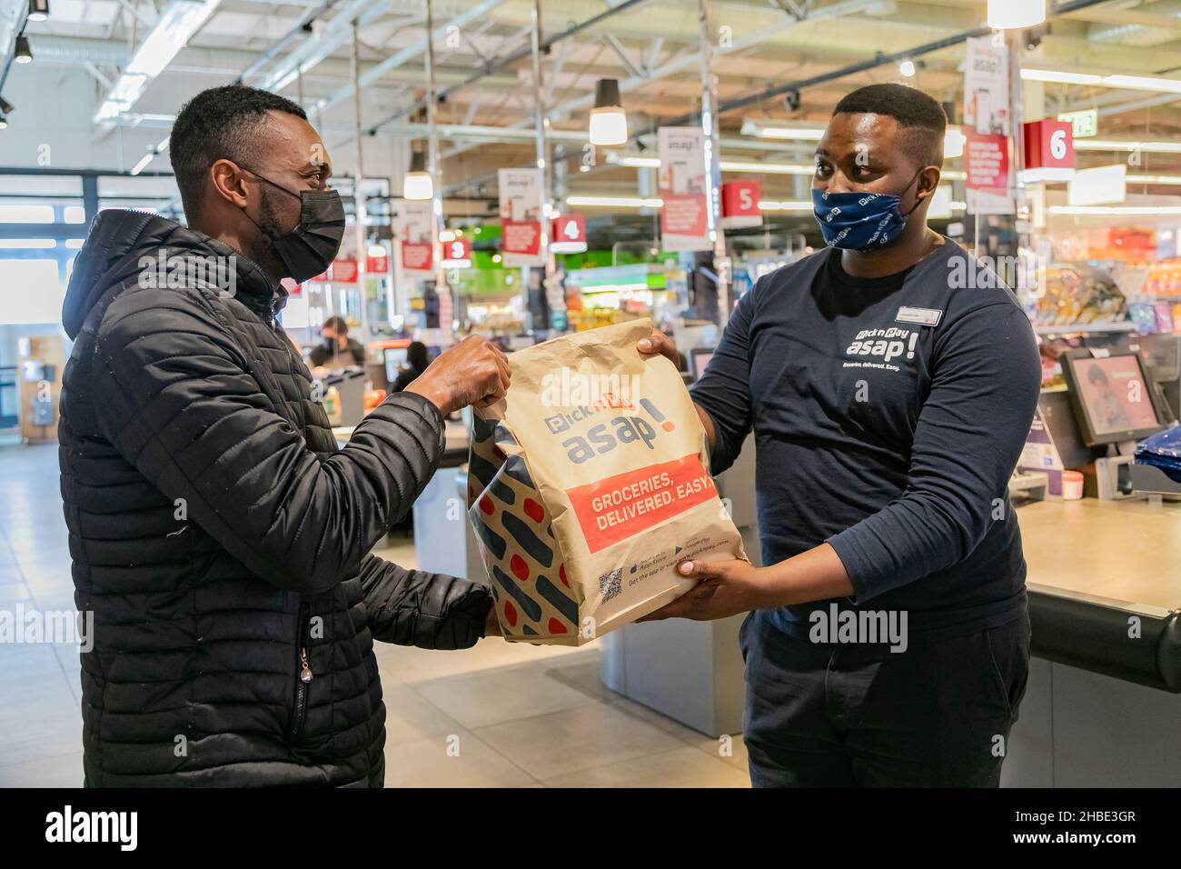 CAPE TOWN, SOUTH AFRICA Oct 26, 2021 An African courier taking the