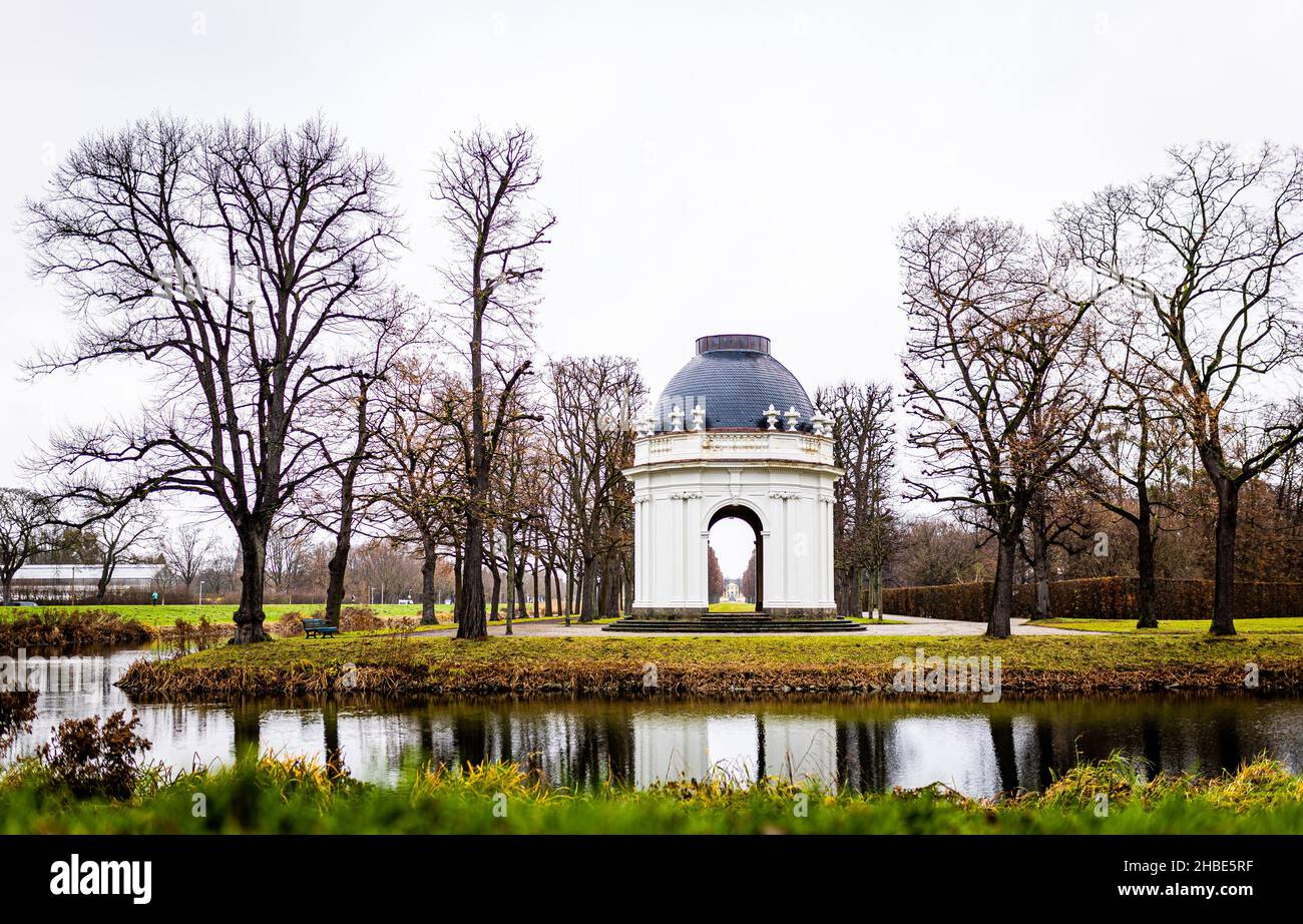 Hanover, Germany. 19th Dec, 2021. A corner pavilion by the French architect Remy de la Fosse is located in the Herrenhäuser Gardens behind the Graft. The winter weather in Lower Saxony is gloomy on the 4th Sunday of Advent. Credit: Moritz Frankenberg/dpa/Alamy Live News Stock Photo