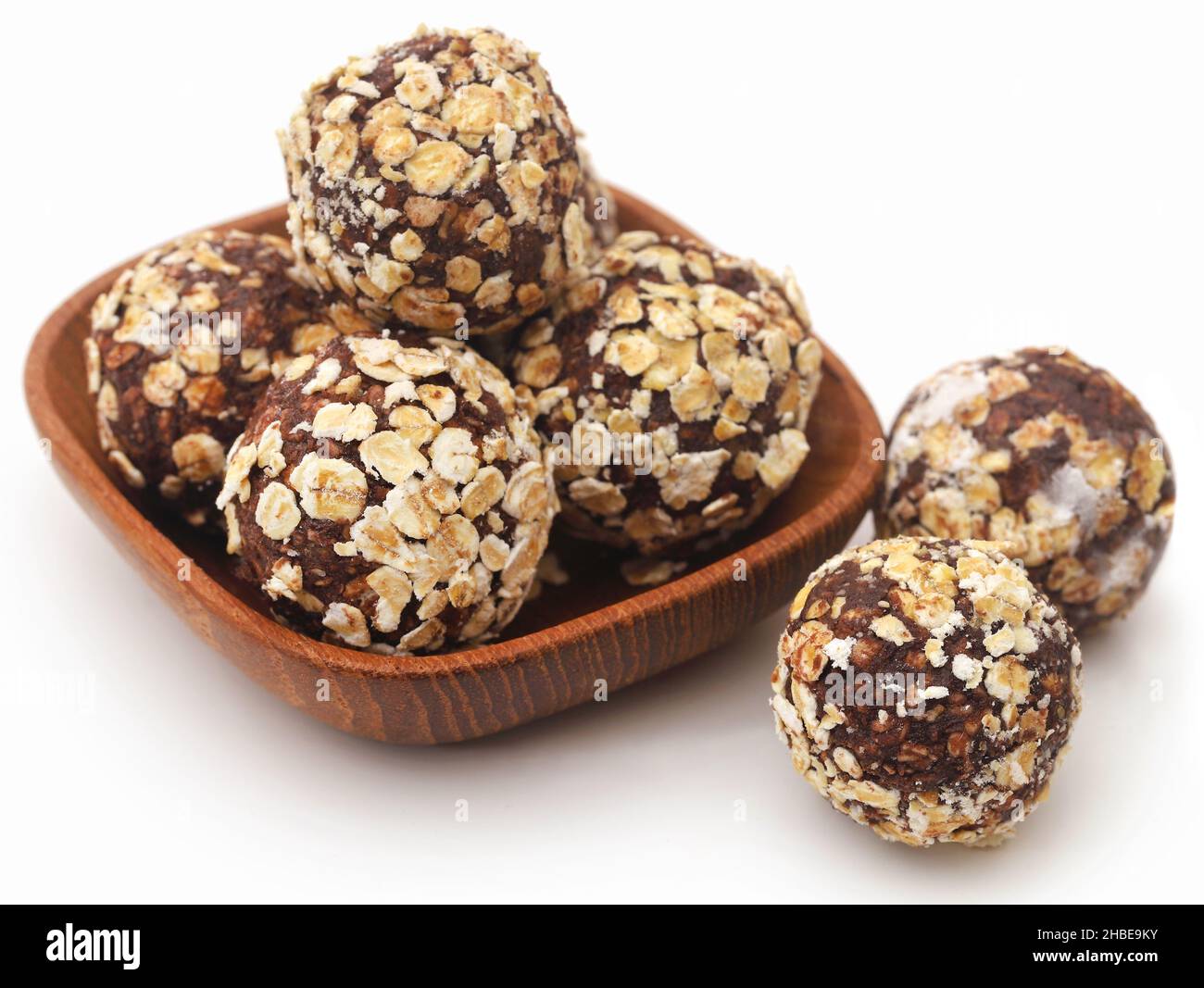 Oatmeal balls, a popular Christmas candy in a bowl over white