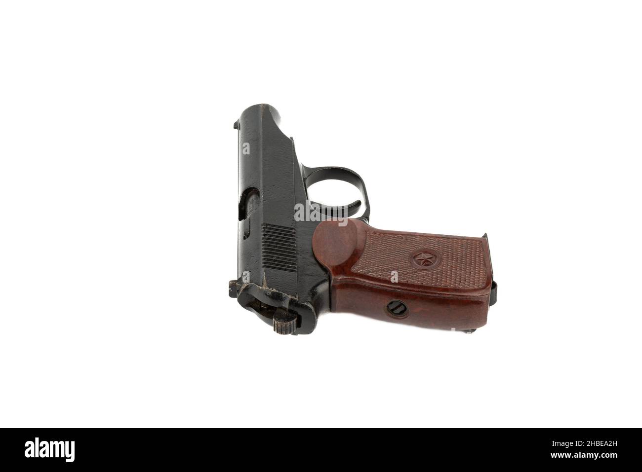 Old used Makarov pistol isolated on white background. Copy space. Stock Photo