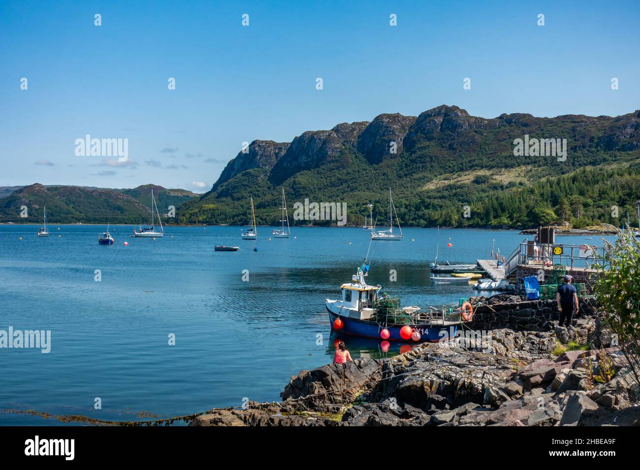 The beautiful village of Plockton, known as the Jewel of the Highlands, which overlooks Loch Carron in Scotland Stock Photo