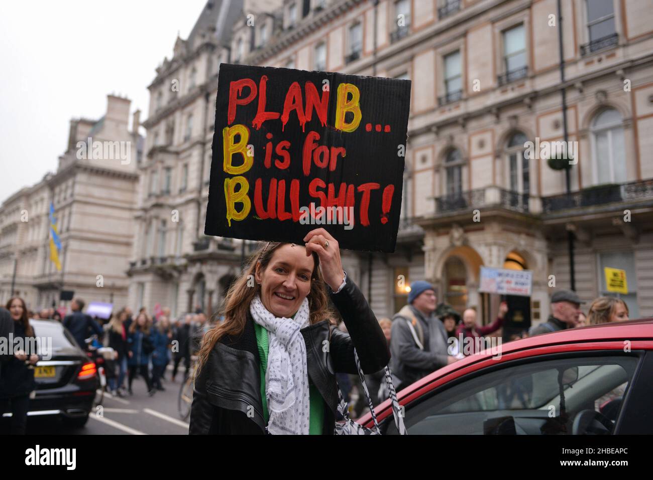 A protester holds a placard expressing her opinion, at Victoria Street during the demonstration. Anti vaccine and anti vaccine pass protesters joined by opponents of Covid 19 restrictions, gathered at Parliament Square and marched through central London. Stock Photo