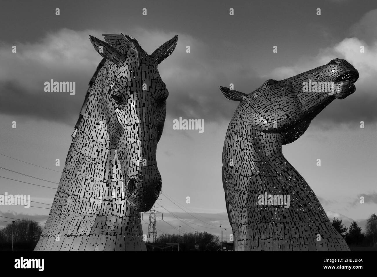 Black and white Kelpies in Scotland  is just outside Falkirk this is a magnificent monument to working horses Stock Photo
