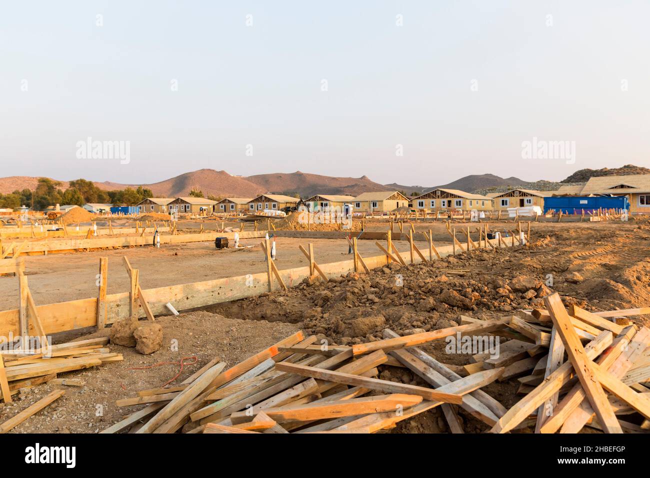 Piles of discarded wood debris on a construction site Stock Photo Alamy