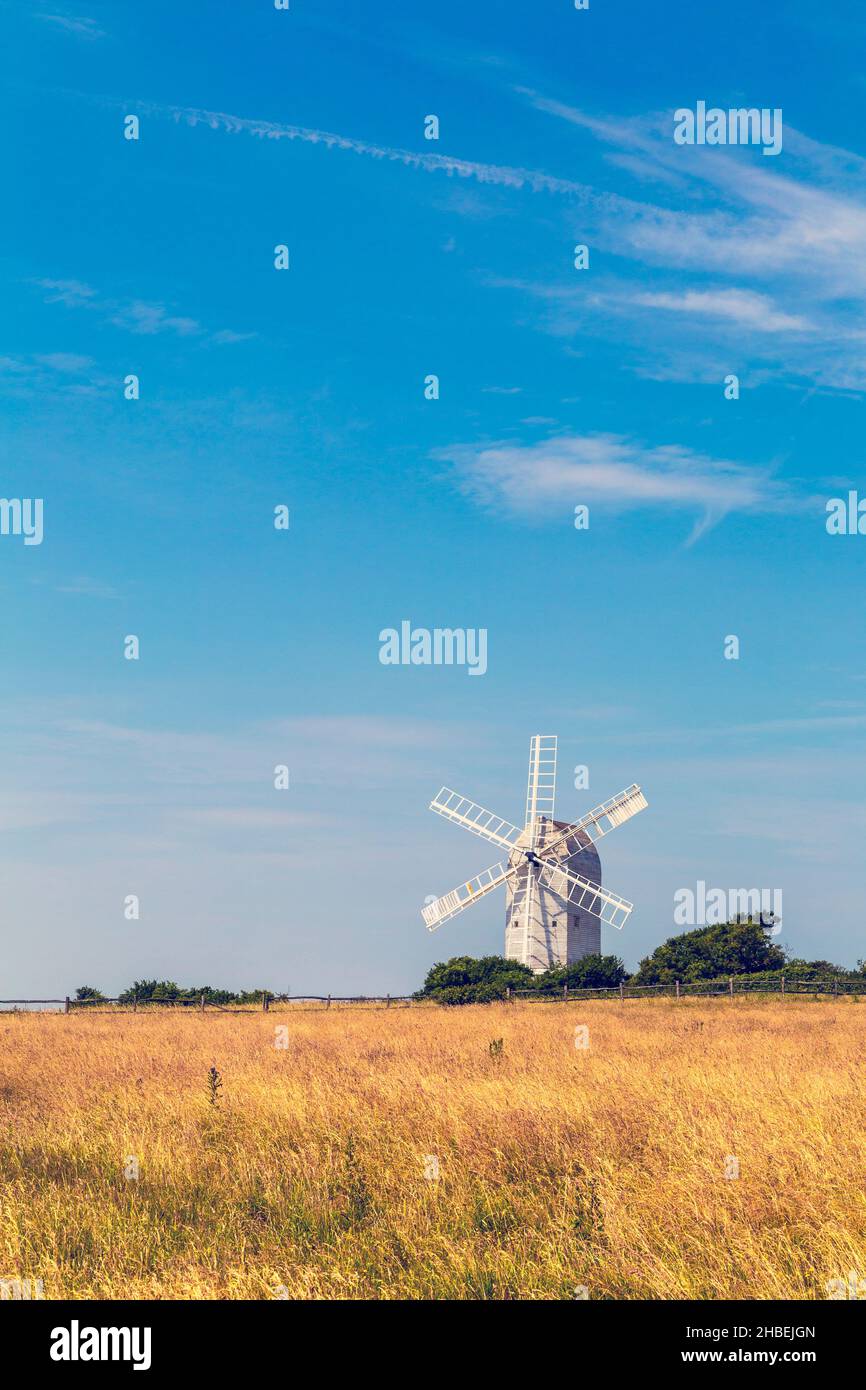 White wooden windmill in a field - Ashcombe Windmill in Kingston near Lewes, South Downs National Park, England, UK Stock Photo