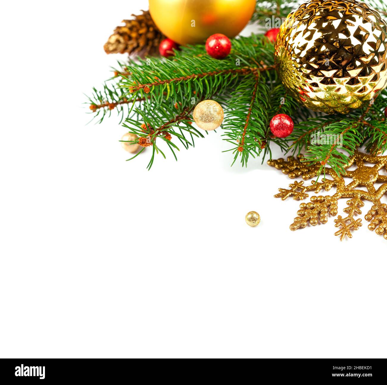 Christmas fir decoration with Christmas baubles, pinecone and snowflake ornament Stock Photo