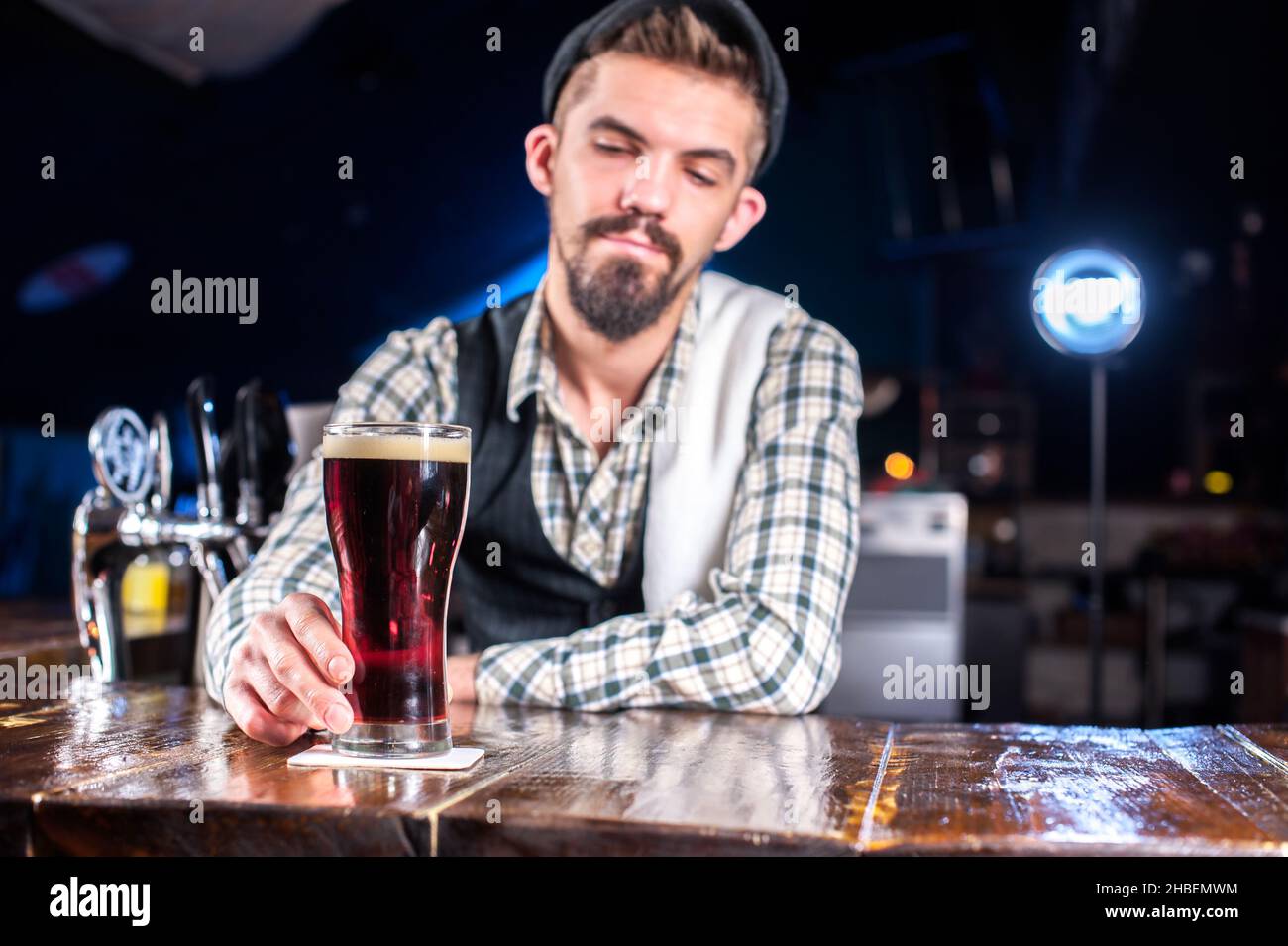Young bartender demonstrates his professional skills Stock Photo - Alamy