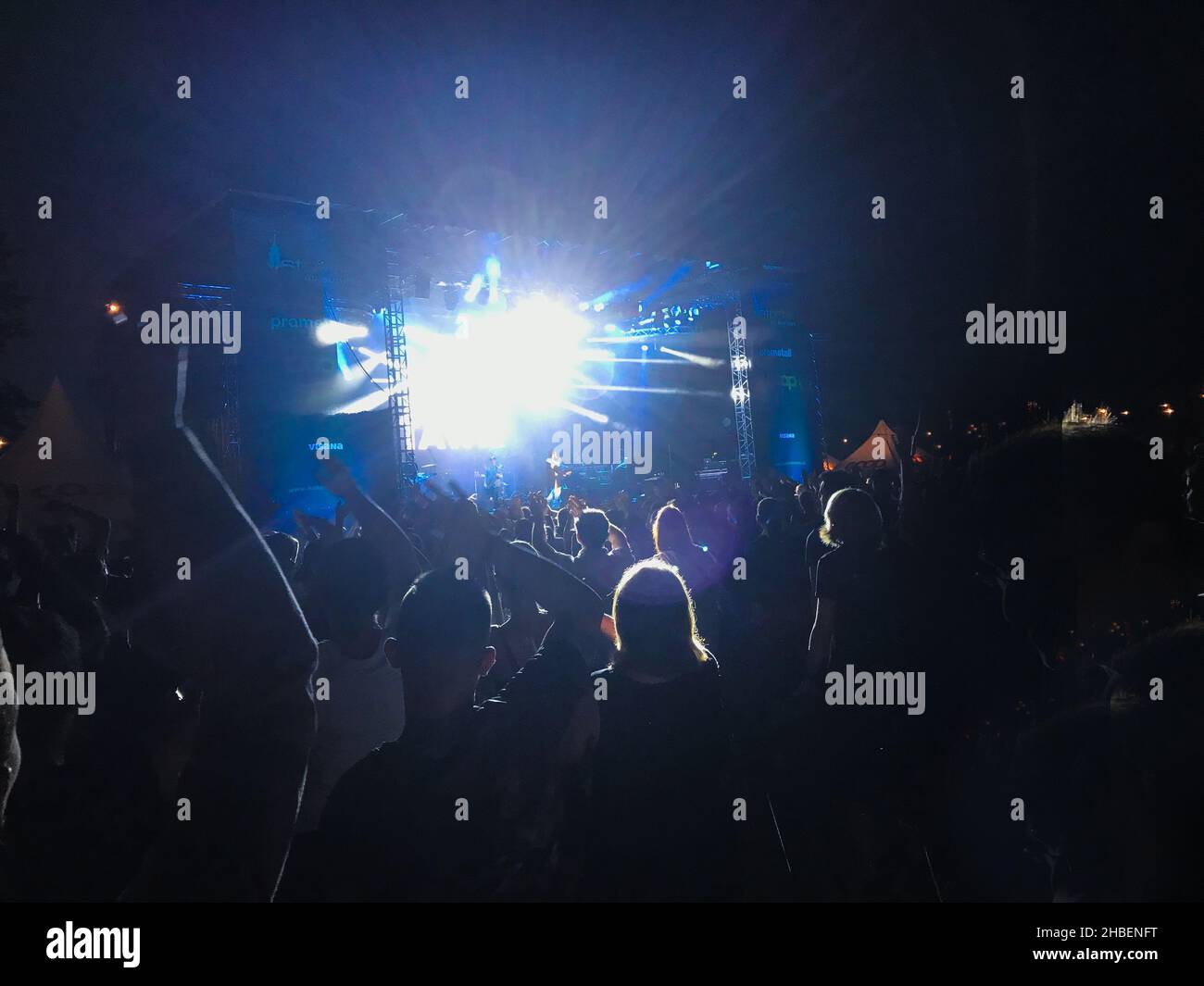 Outdoor Concert with lights and the audience dancing Stock Photo Alamy