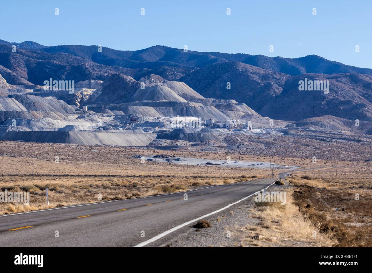 Road leading towards mining operation on a mountain in gabbs nevada