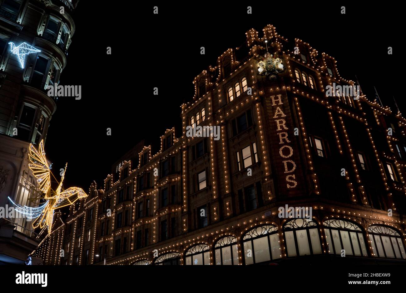 Front of Harrods luxury department store at night, London, England,UK