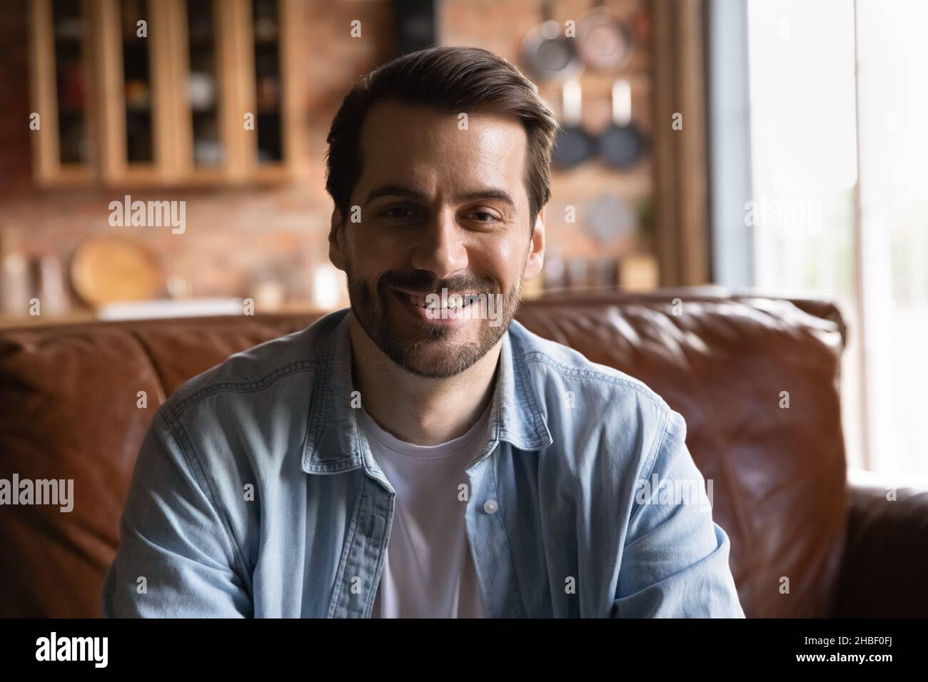 Head shot smiling handsome young man looking at camera. Stock Photo