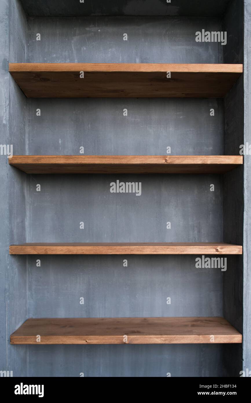 Shelves in the home interior. Natural materials concrete and wood Stock ...