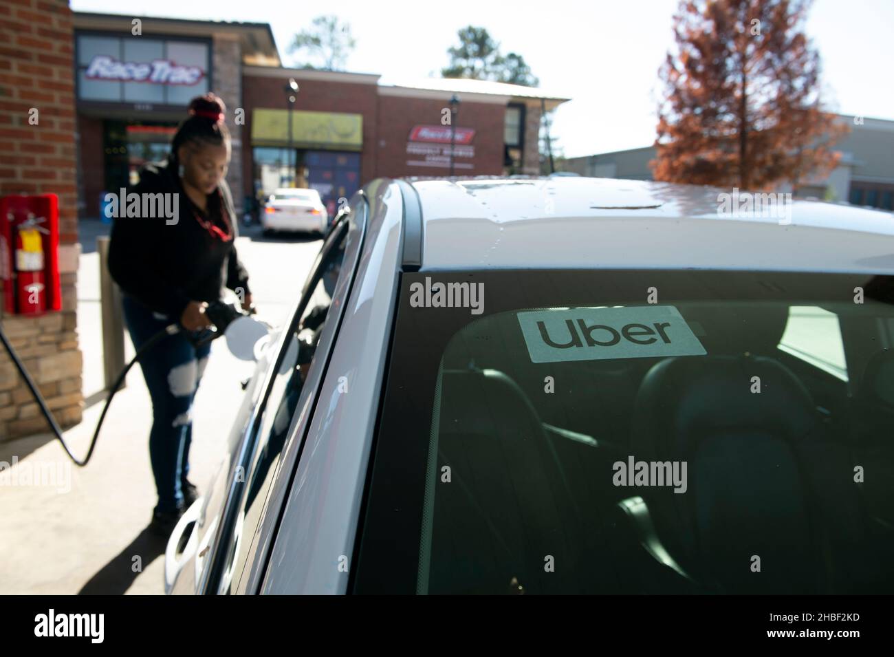 Smyrna, USA. 19th Dec, 2021. Quick fills her rental