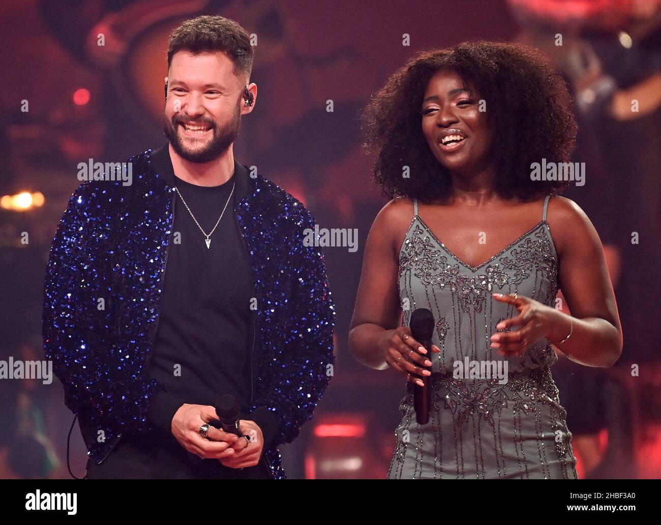 Berlin, Germany. 19th Dec, 2021. Singer Gugu Zulu and singer Calum Scott  will be on stage at the final of the casting show "The Voice of Germany  2021". Credit: Britta Pedersen/dpa-Zentralbild/dpa/Alamy Live