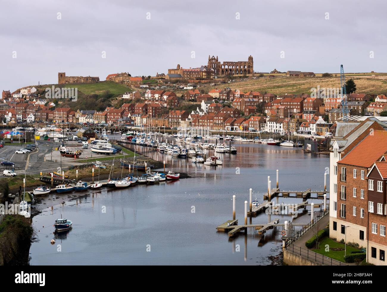 Whitby harbour, including the Abbey and St Mary's Church, North Yorkshire, UK. Stock Photo