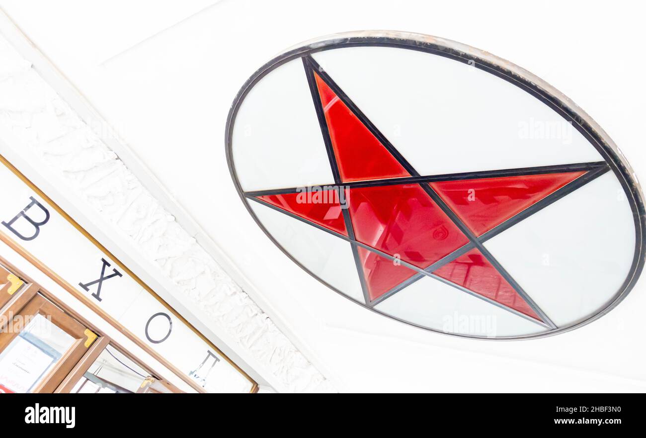 Red star stained glass decoration above the entrance to Metro Sokolniki, Moscow, Russia. The artwork was reconstructed in 2018 Stock Photo
