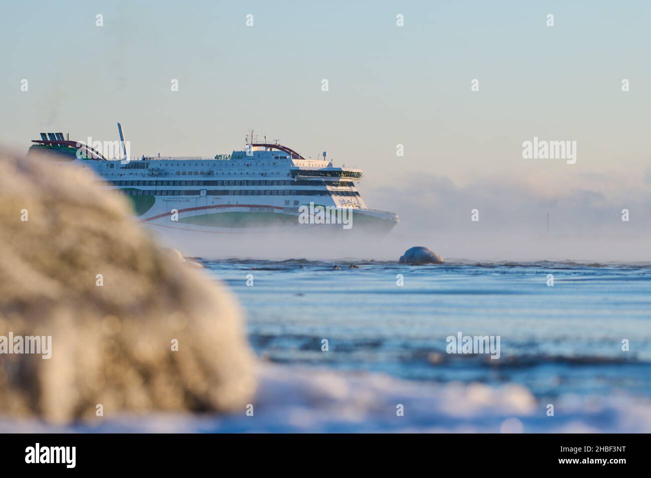 Helsinki, Finland - December 5, 2021: Tallink M/S Megastar ferry departing to Tallinn from Helsinki in extremely cold winter conditions. Stock Photo