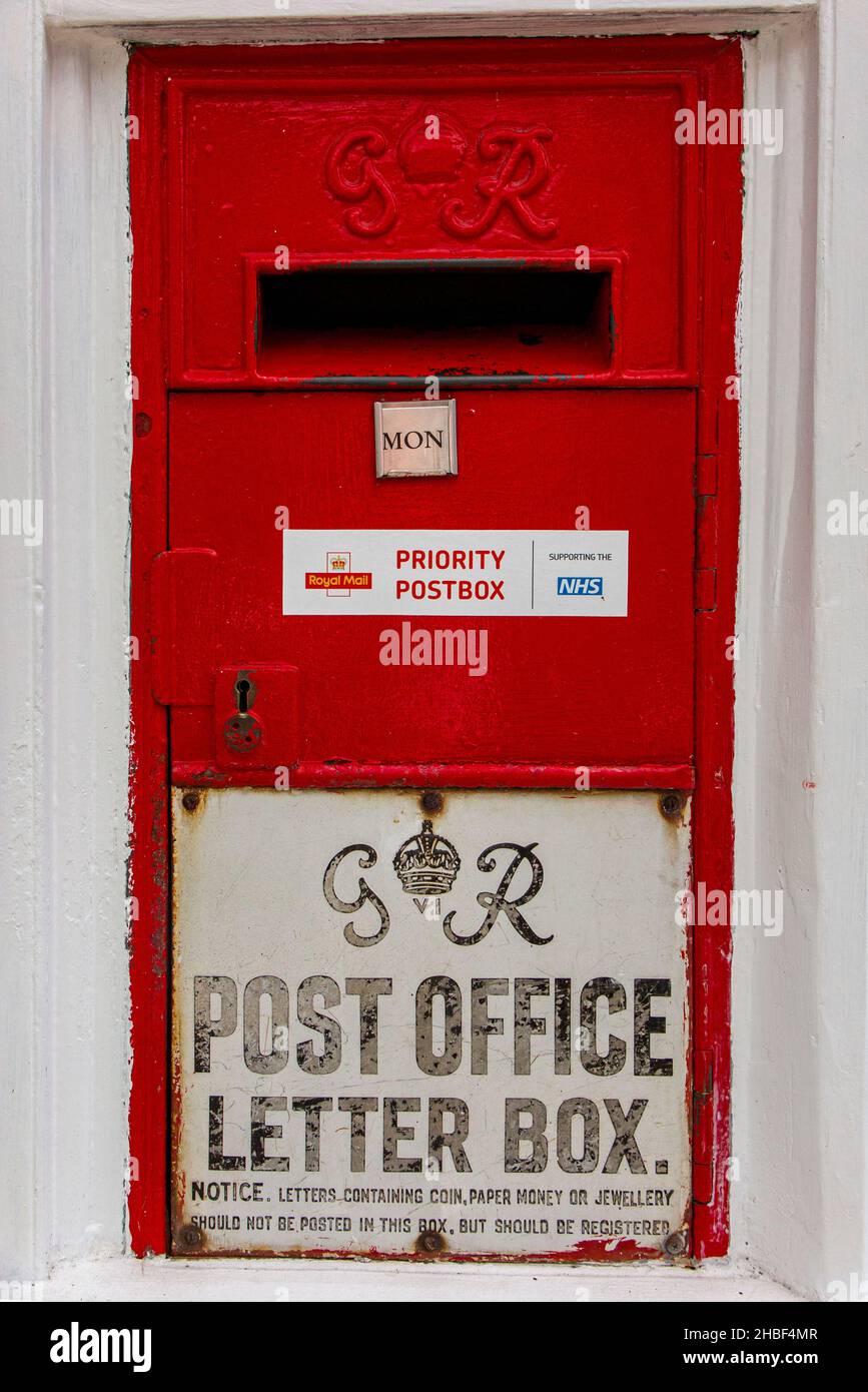 A traditional old fashioned post box from the reign of George VI inCharing, Kent. Stock Photo