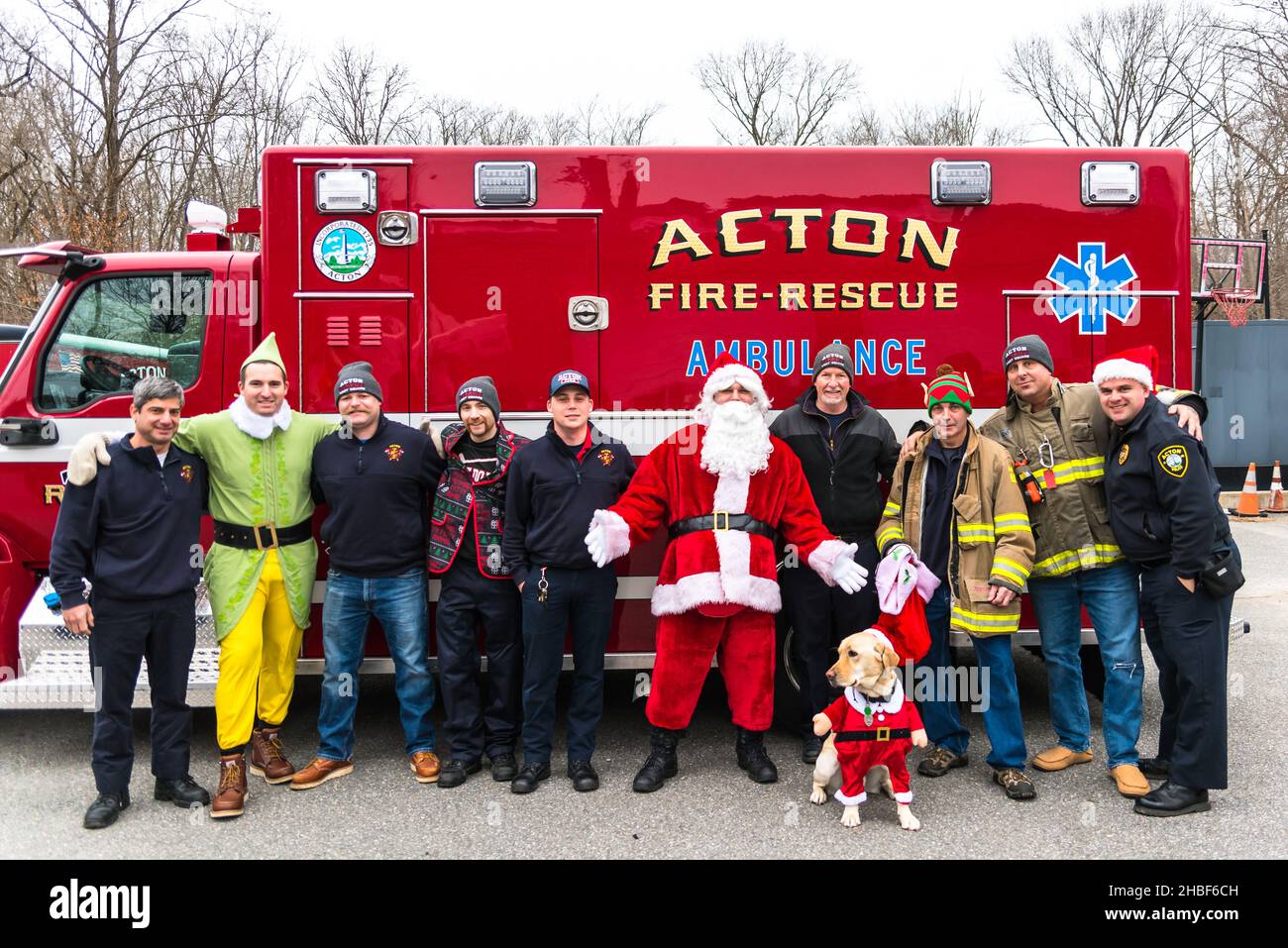 Acton MA Firefighters and Police organized event to reach out to the community, say hi to children, and collect food for the local food pantry. Stock Photo