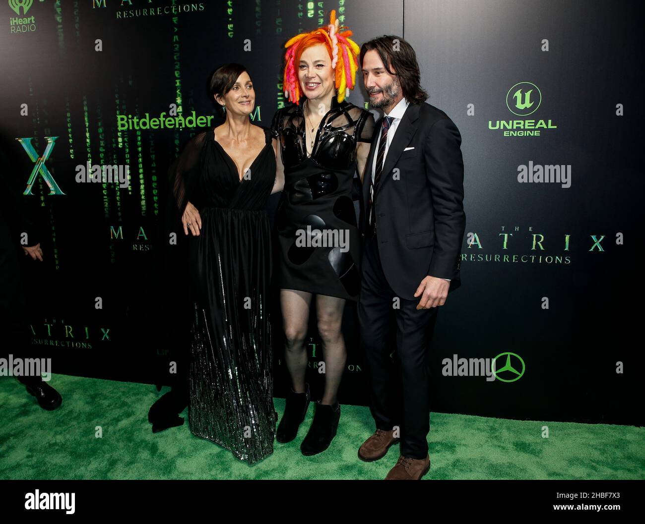 San Francisco, USA. 18th Dec, 2021. Carrie-Anne Moss, Lana Wachowski and Keanu Reeves on the green carpet at the U.S. movie premier of The Matrix Resurrections at the Castro Theater on December, 18, 2021 in San Francisco, California. (Photo by Christopher Victorio/imageSPACE/Sipa USA) Credit: Sipa USA/Alamy Live News Stock Photo
