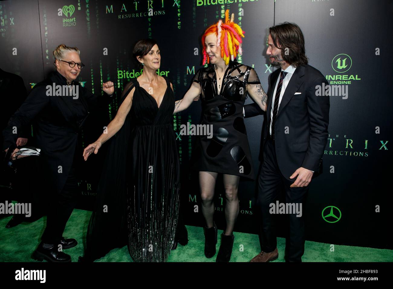 San Francisco, USA. 18th Dec, 2021. Karin Wachowski, Carrie-Anne Moss, Lana Wachowski and Keanu Reeves on the green carpet at the U.S. movie premier of The Matrix Resurrections at the Castro Theater on December, 18, 2021 in San Francisco, California. (Photo by Christopher Victorio/imageSPACE/Sipa USA) Credit: Sipa USA/Alamy Live News Stock Photo