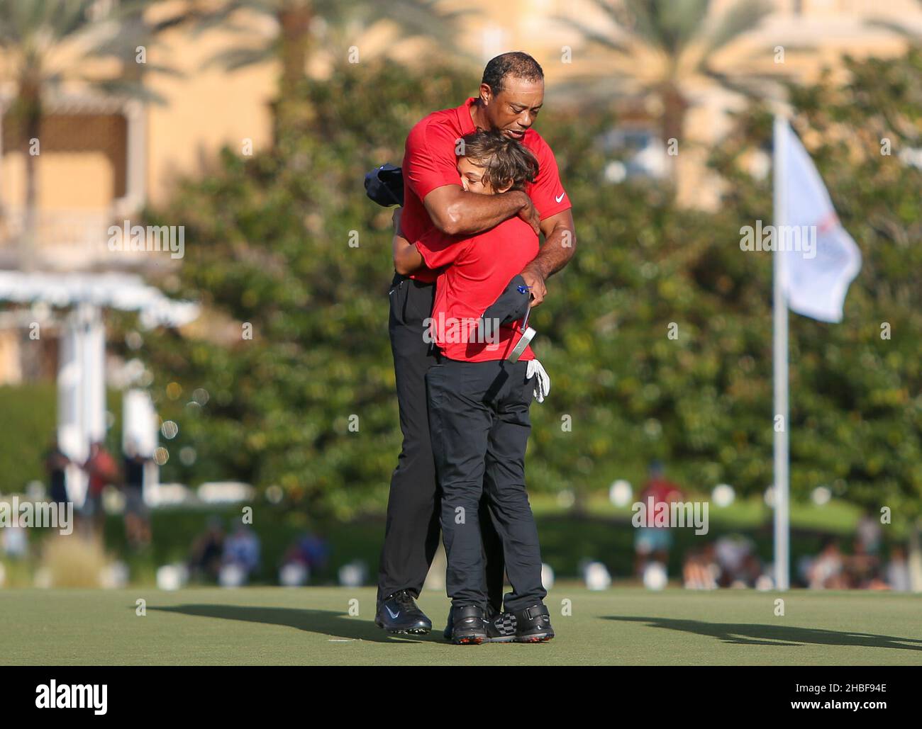 Orlando, Florida, USA. 19th Dec, 2021. Tiger Woods gives his son