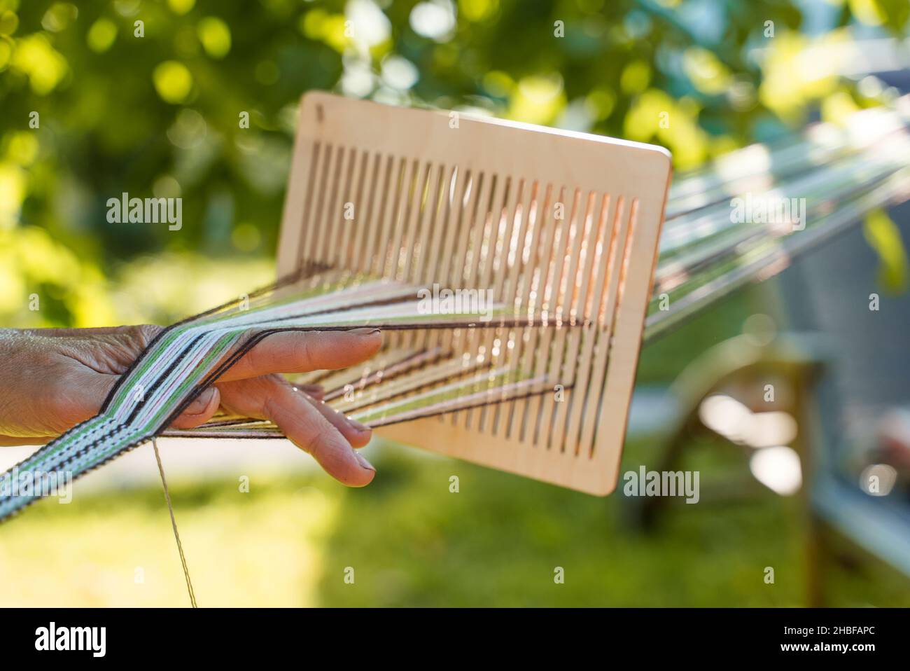 Traditional hand weaving on a reed Stock Photo Alamy