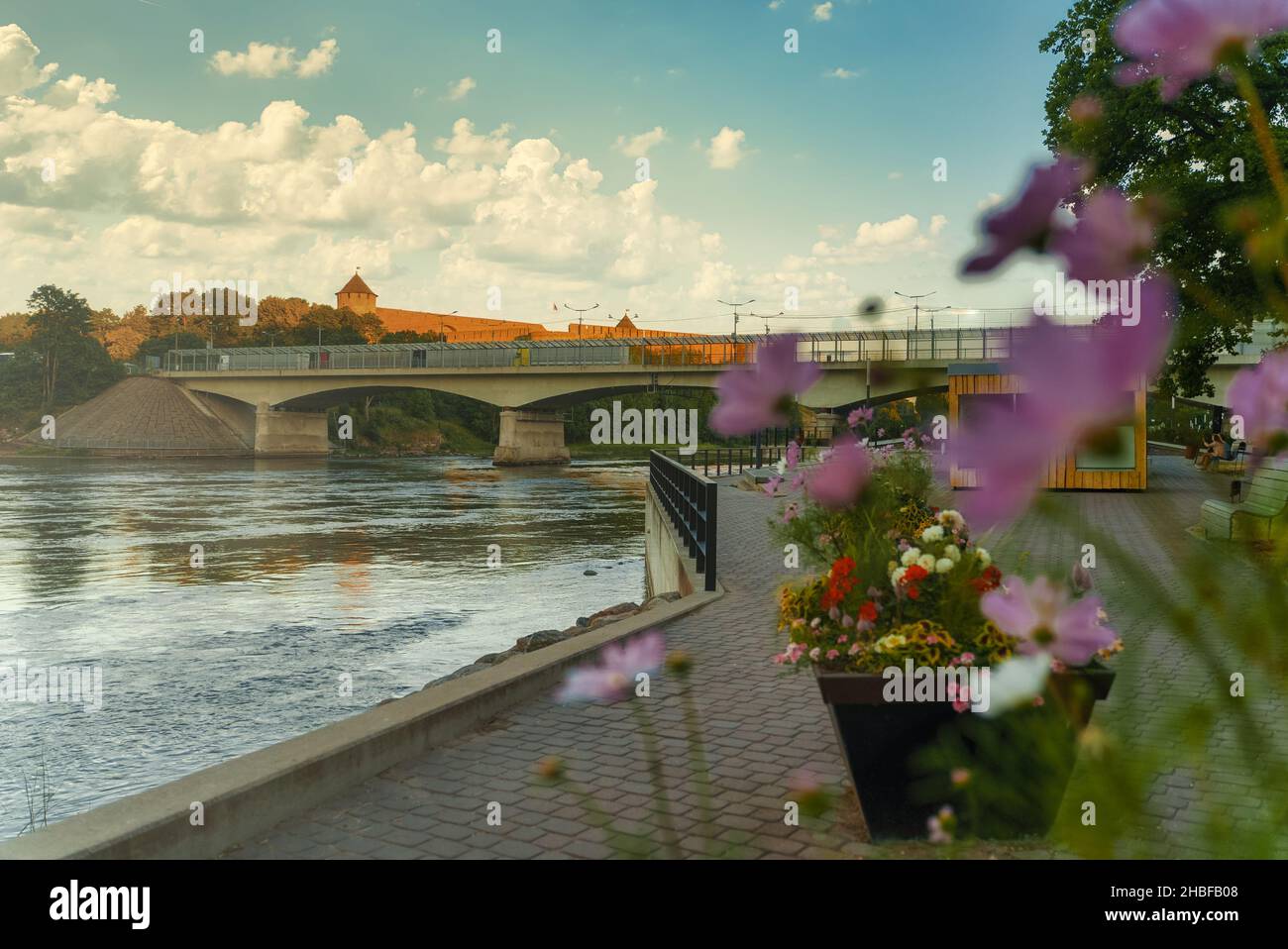 Promenade by the river Narva in Estonia. Stock Photo