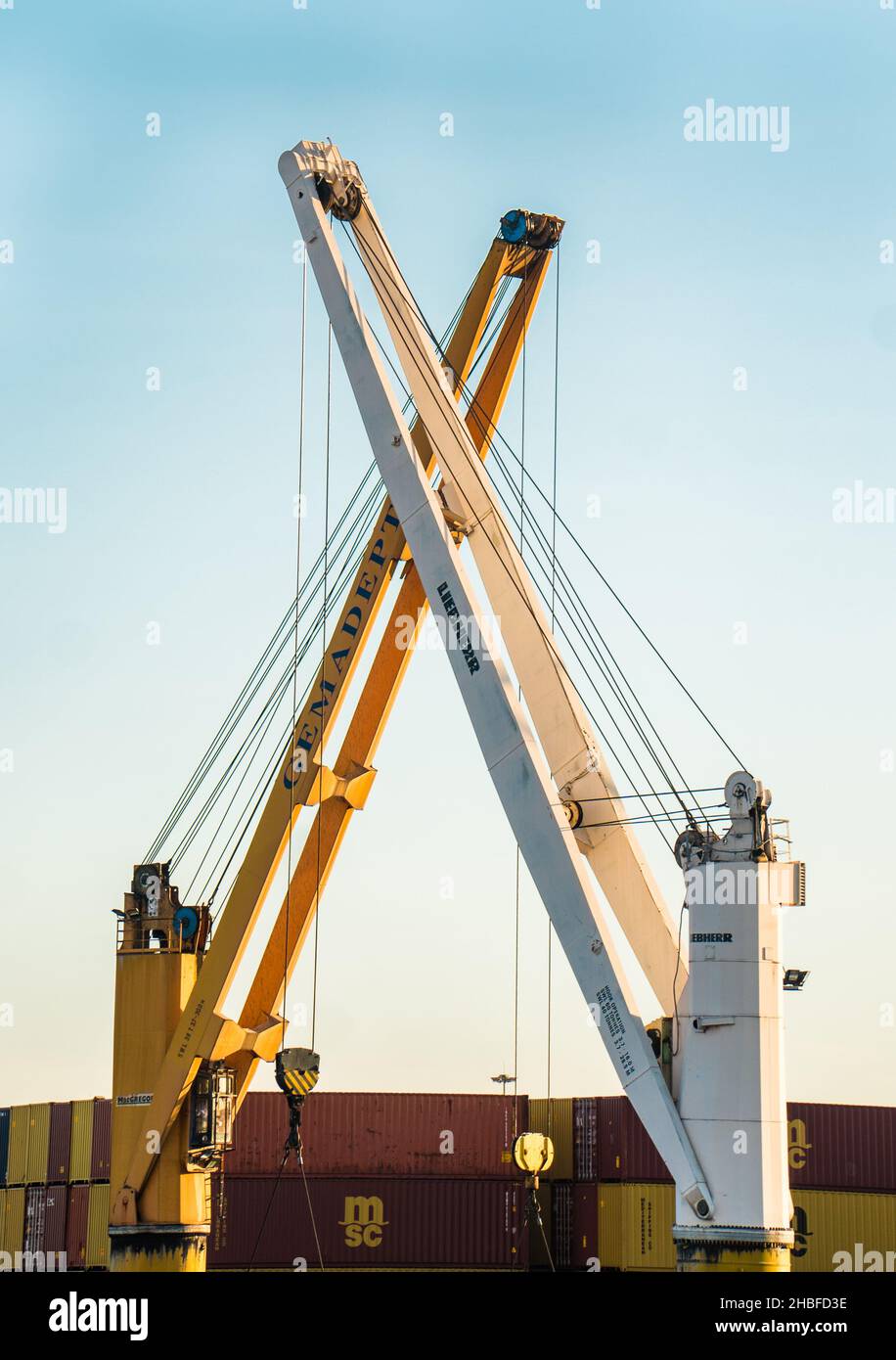 A vertical shot of the construction crane in the time of daylight Stock ...