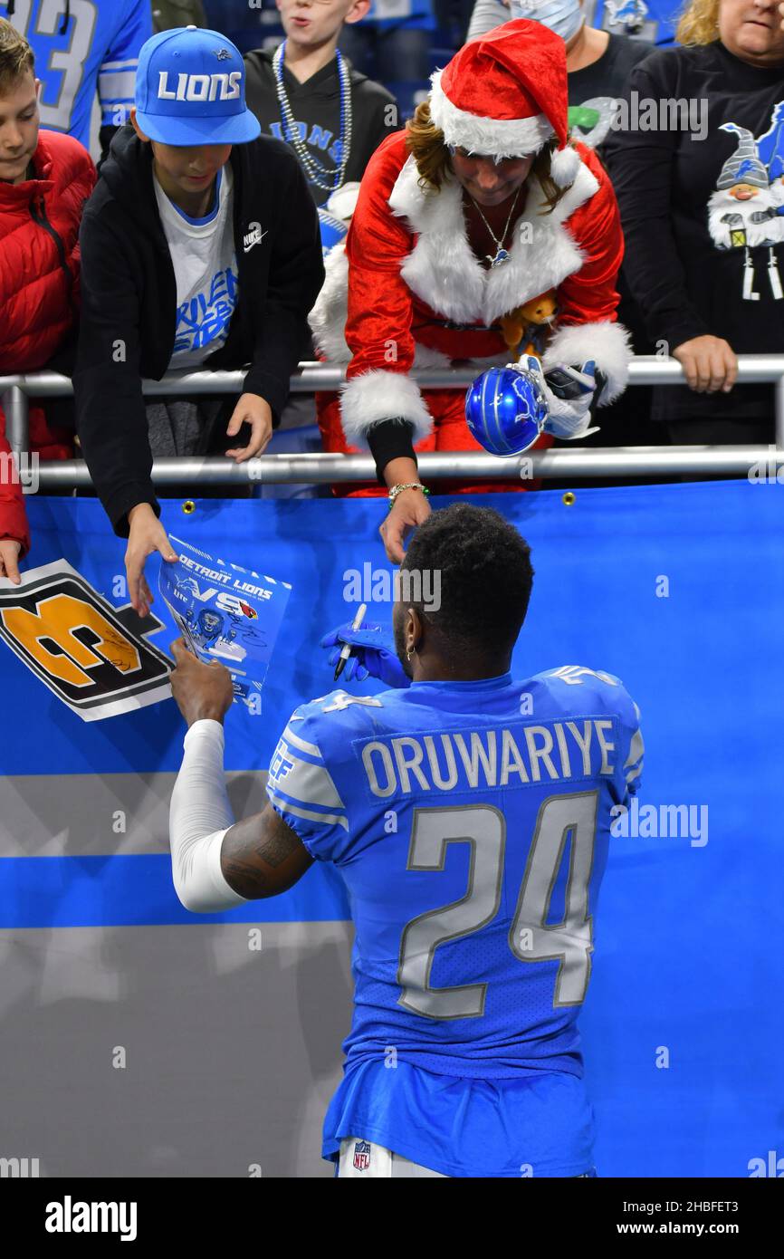 DETROIT, MI - NOVEMBER 24: Fans cheer as the Detroit Lions team