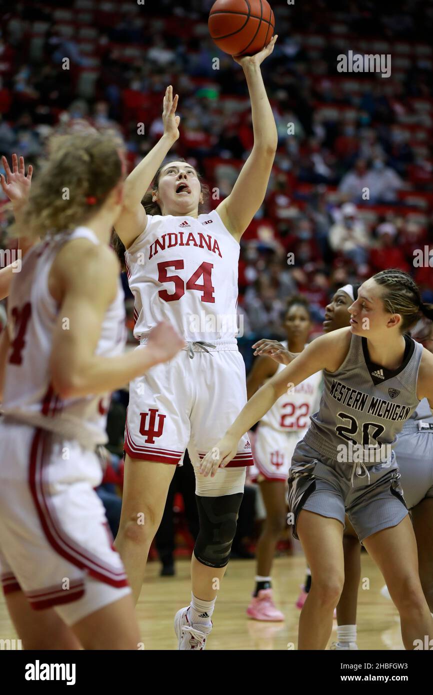 BLOOMINGTON, UNITED STATES - 2021/12/19: Indiana Hoosiers forward Mackenzie Holmes (54) shoots against Western Michigan Broncos guard Sydney Shafer (20) during an NCAA women's basketball game on December 19, 2021 at Assembly Hall in Bloomington, Ind. IU beat Western Michigan 67-57. Stock Photo