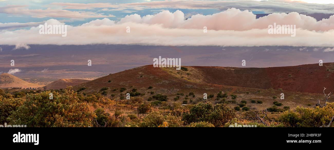 Scenic sunset view from the road leading to the observatories atop Mauna Kea and Onizuka Center for International Astronomy Visitor Station. Hawaii Stock Photo