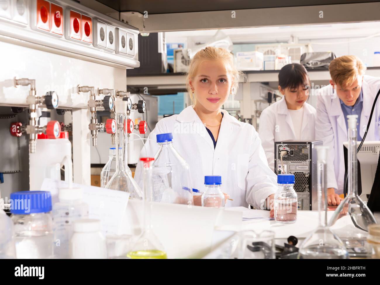 Student working in college laboratory Stock Photo - Alamy