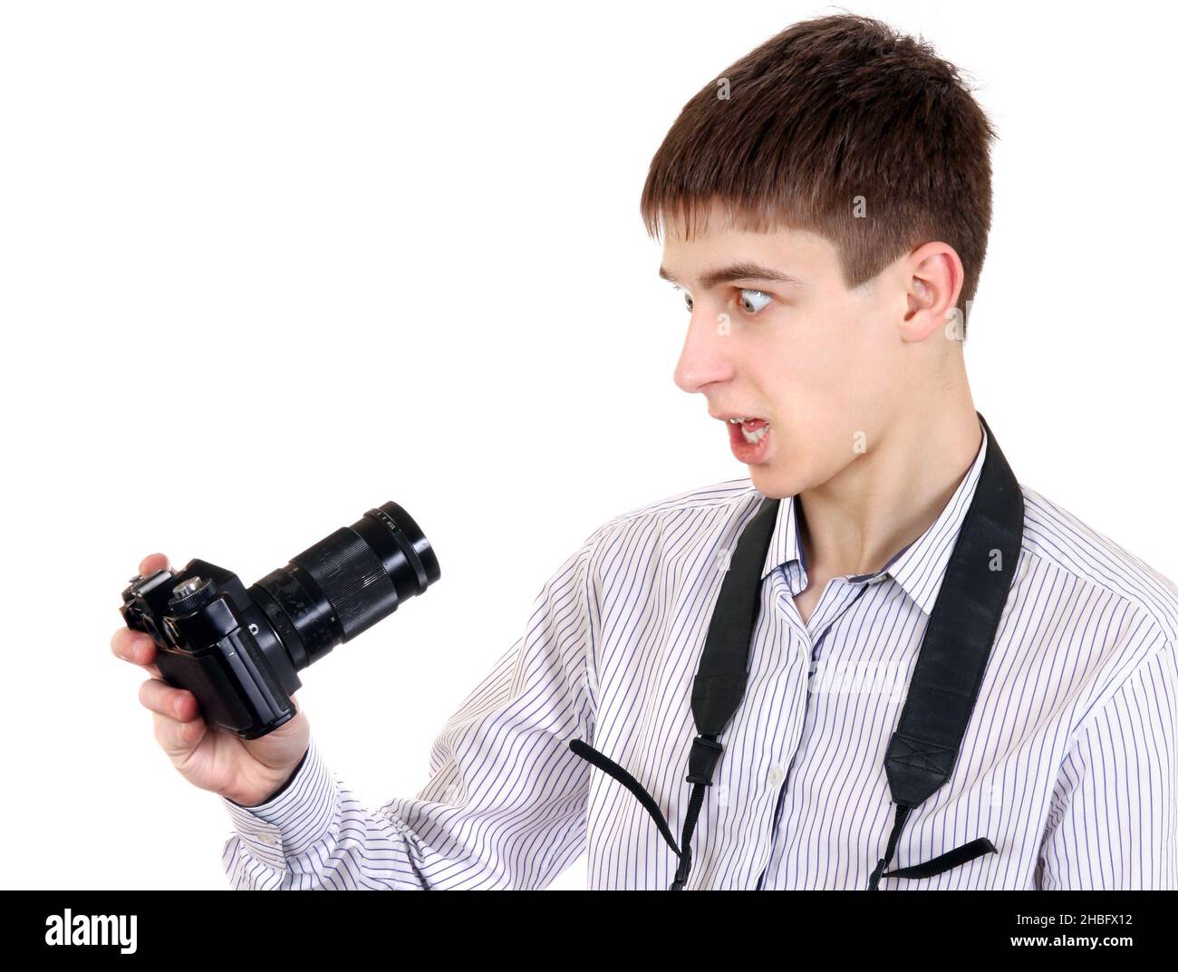 Surprised Teenager taking a Self Portrait Isolated on the White Background Stock Photo