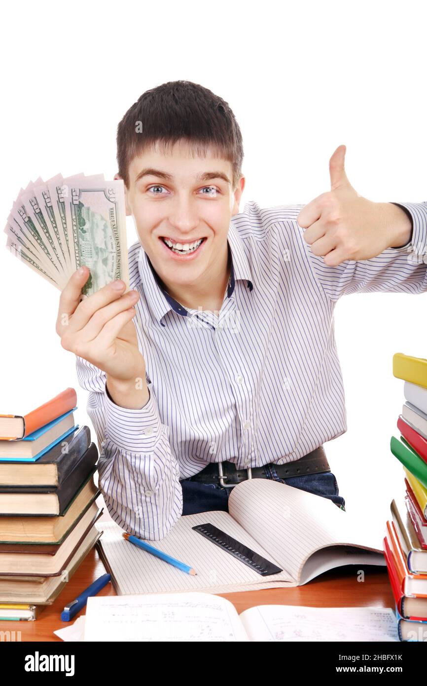 Happy Student with a Money at the School Desk on the white background Stock Photo